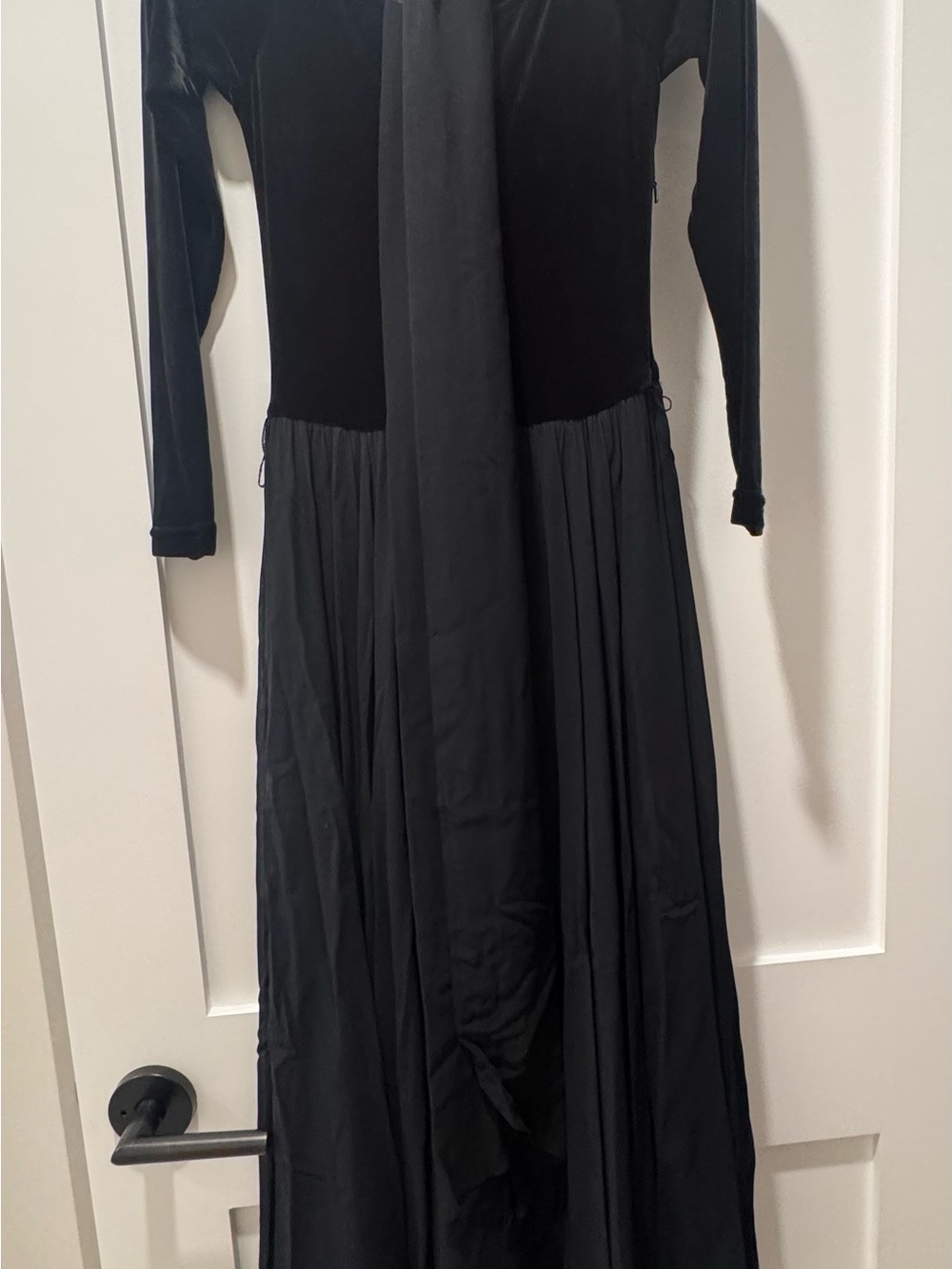Elegant Black Long-Sleeve Maxi Dress with Draped Skirt